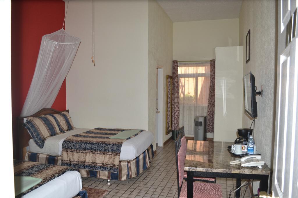 Executive Airport Hotel Entebbe Ruang foto